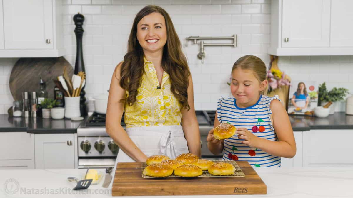 Natasha and Daughter taste testing homemade burger buns