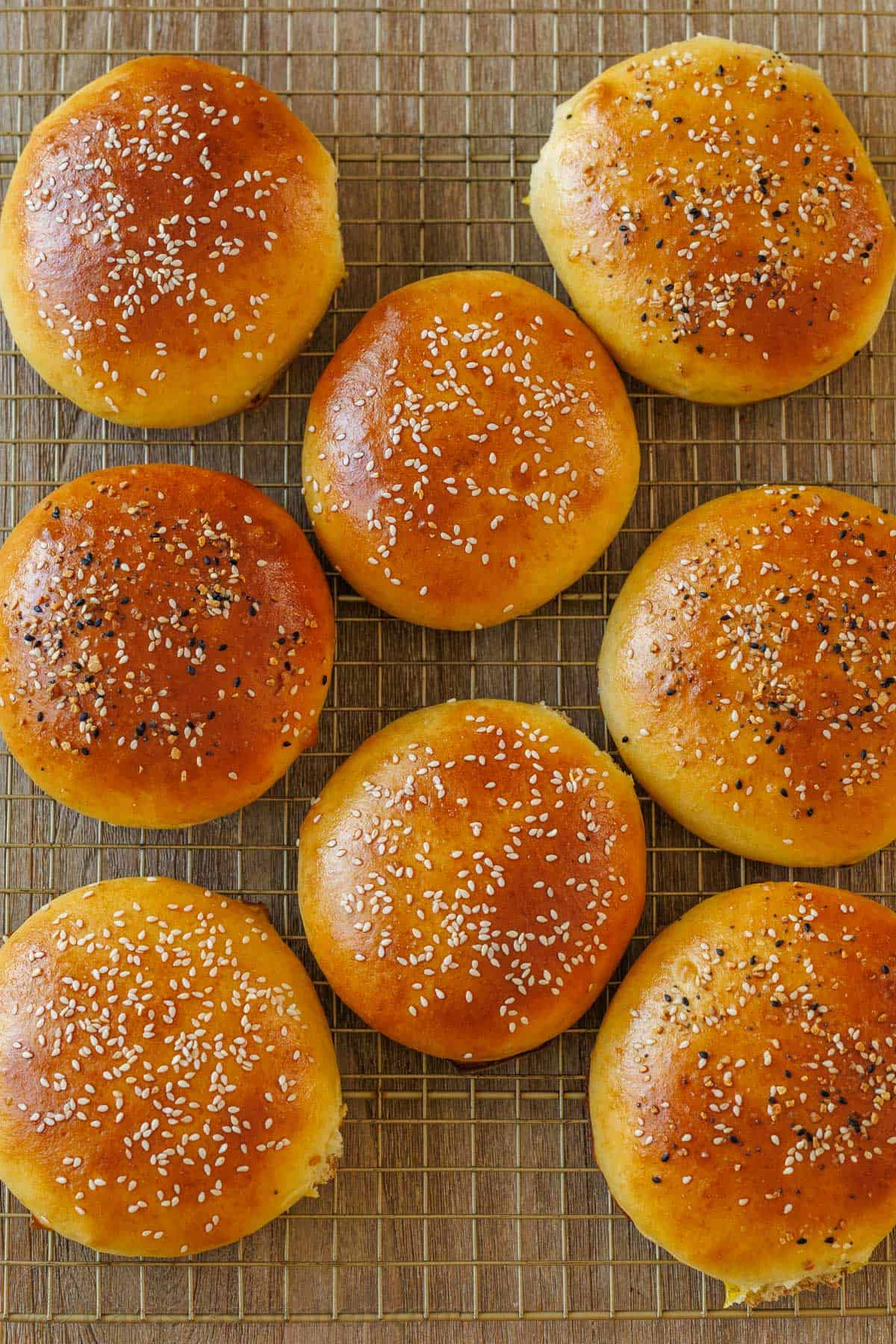 homemade bread with sesame seeds on a wire rack