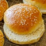 Sliced Homemade hamburger buns with sesame seeds on top