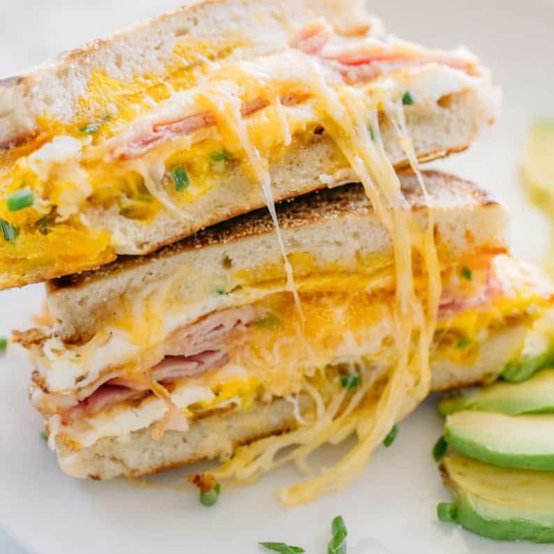 This breakfast sandwich is cheesy, juicy, easy and so delicious! All you need is 5 minutes and 5 ingredients. A one-pan breakfast sandwich recipe with video | natashaskitchen.com