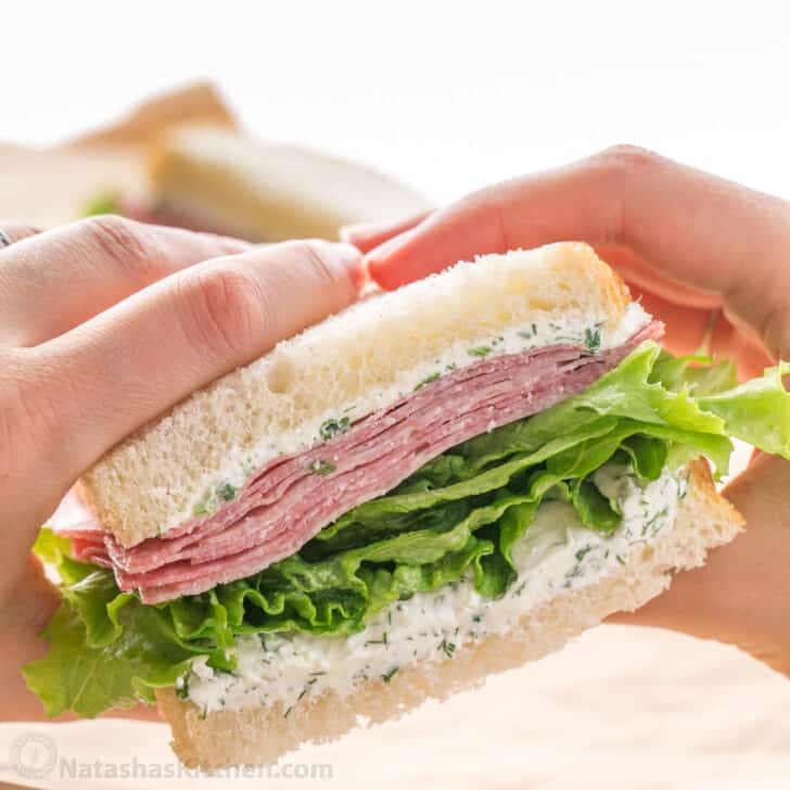 Salami sandwich with herbed cream cheese and lettuce