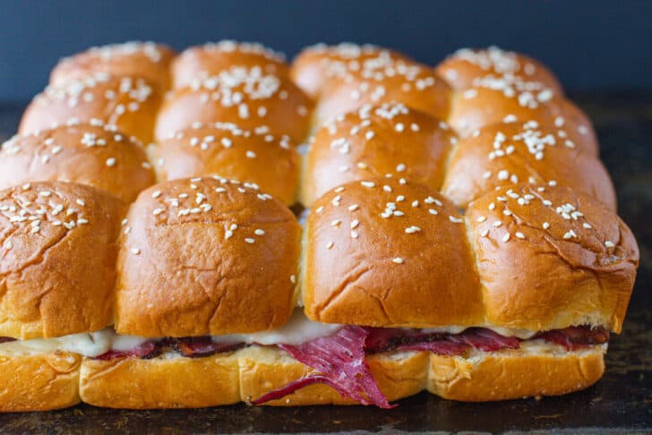 Baked Sliders with pastrami beef and provolone