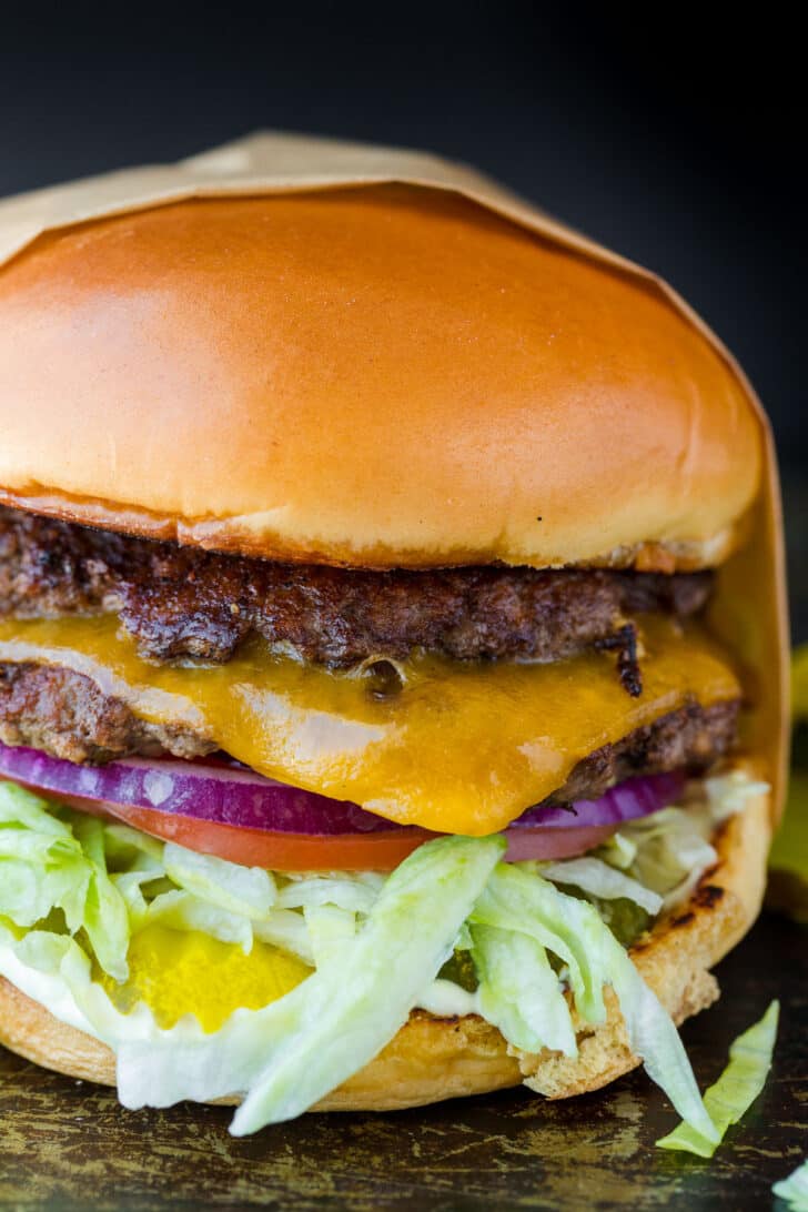 smash burger wrapped in parchment paper